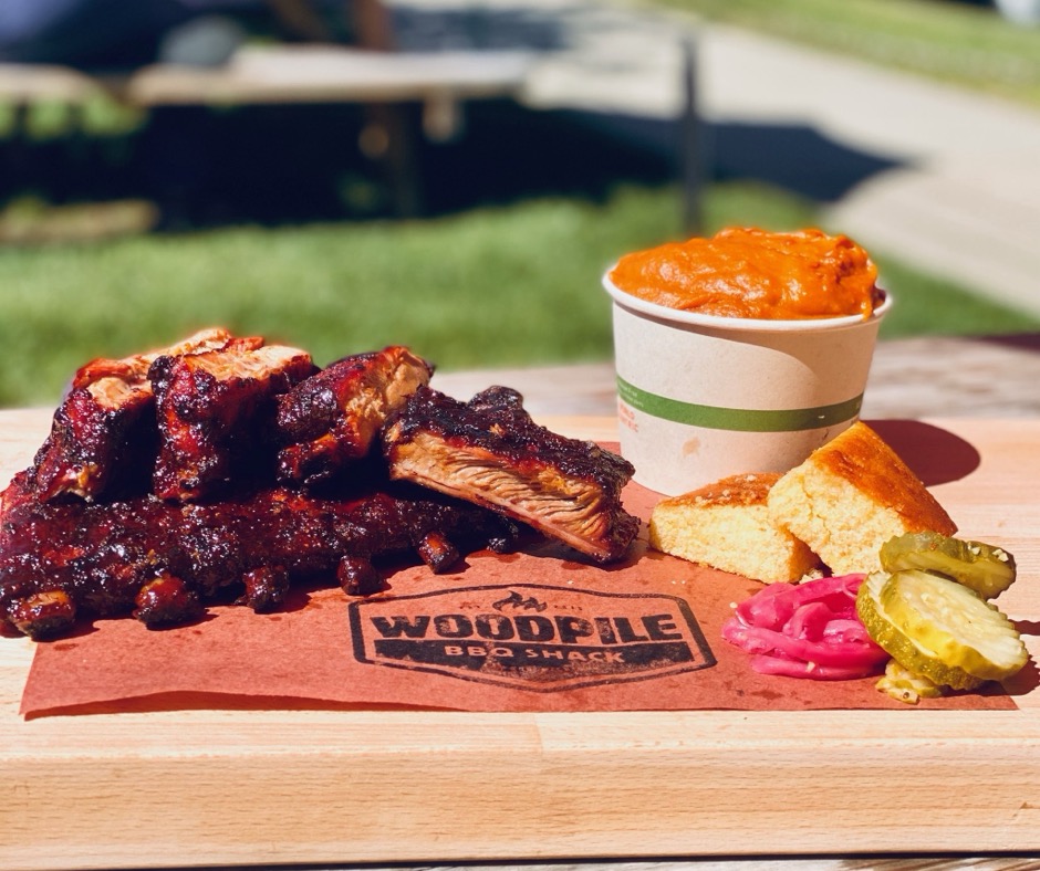 Woodpile BBQ Shack baby back ribs with cornbread and sides